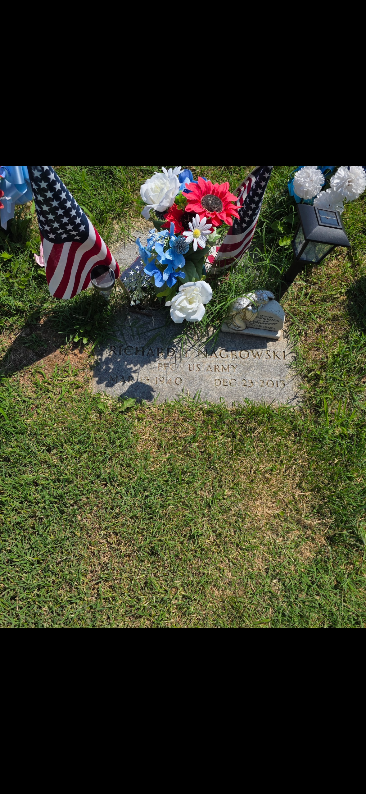 Richard T. Nagrowski headstone before cleaning